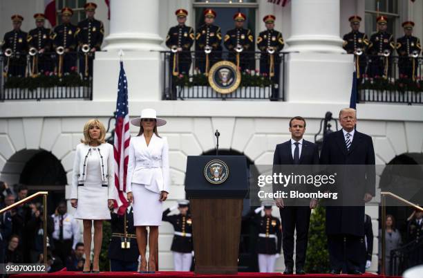 President Donald Trump, from right, Emmanuel Macron, France's president, U.S. First Lady Melania Trump, and Brigitte Macron, France's first lady,...