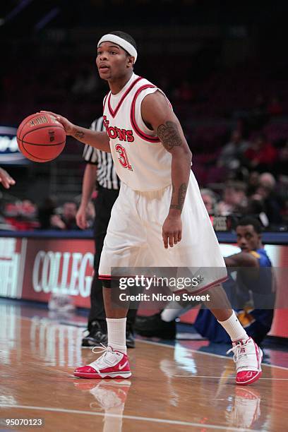 Malik Stith of St. John's Red Storm dribbles against Hofstra Pride at Madison Square Garden on December 20, 2009 in New York, New York.