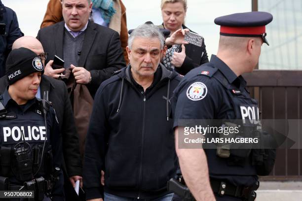 Vic Minassian, the father of suspect Alek Minassian leaves court after his son Alek's court appearance in Toronto, Ontario, on April 24, 2018. - A...