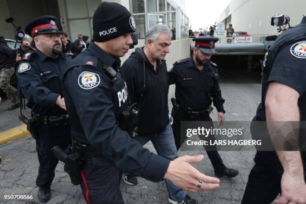 Vic Minassian, the father of suspect Alek Minassian leaves court after his son Alek's court appearance in Toronto, Ontario, on April 24, 2018. - A...