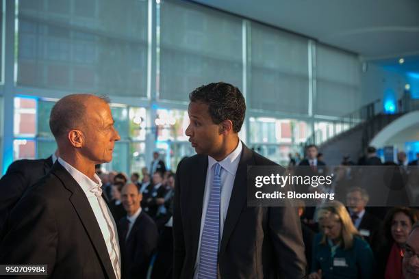 Tom Enders, chief executive officer of Airbus SE, left, speaks with Bertrand-Marc Allen, president of Boeing Co., before taking part in a panel...