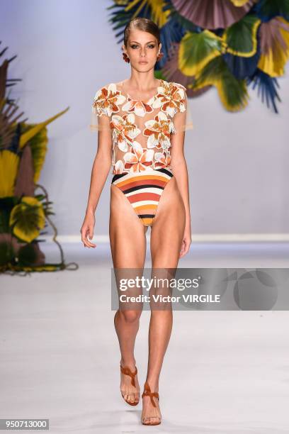 Model walks the runway at the Agua de Coco fashion show during the SPFW N45 Spring Summer 2019 on April 21, 2018 in Sao Paulo, Brazil.