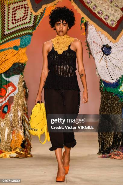 Model walks the runway at the Projeto Ponto Firme Fall Winter 2018 fashion show during the SPFW N45 Summer 2019 on April 21, 2018 in Sao Paulo,...