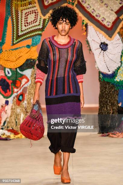 Model walks the runway at the Projeto Ponto Firme Fall Winter 2018 fashion show during the SPFW N45 Summer 2019 on April 21, 2018 in Sao Paulo,...