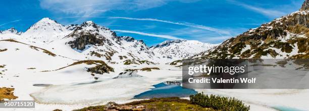 panorama, mountain landscape, snow, semi-frozen lake, rohrmoos-untertal, schladming tauern, schladming, styria, austria - schladming stock pictures, royalty-free photos & images