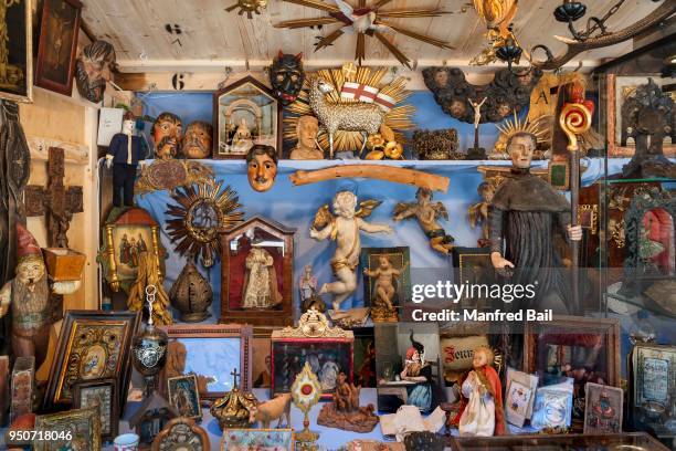 booth with devotional objects, auer dult, munich, bavaria, germany - christian auer stockfoto's en -beelden