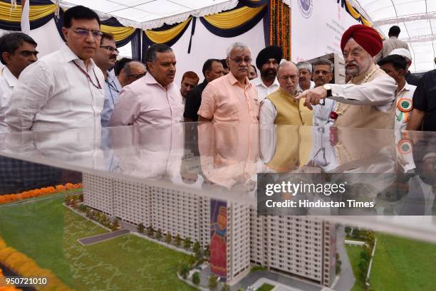 Hardeep Suri, Urban Development Minister along with Anil Baijal, Lieutenant Governor of Delhi with others during the stone-laying ceremony of...