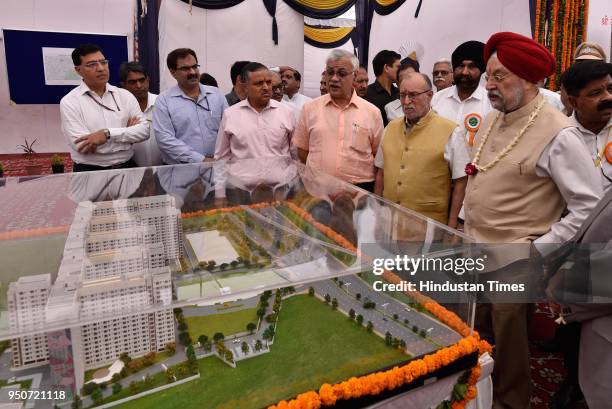 Hardeep Suri, Urban Development Minister along with Anil Baijal, Lieutenant Governor of Delhi with others during the stone-laying ceremony of...