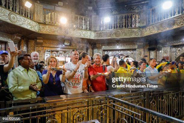 Badminton players from various nations visit the Dagdusheth Ganpati temple, on April 23, 2018 in Pune, India. The international under-19 World School...