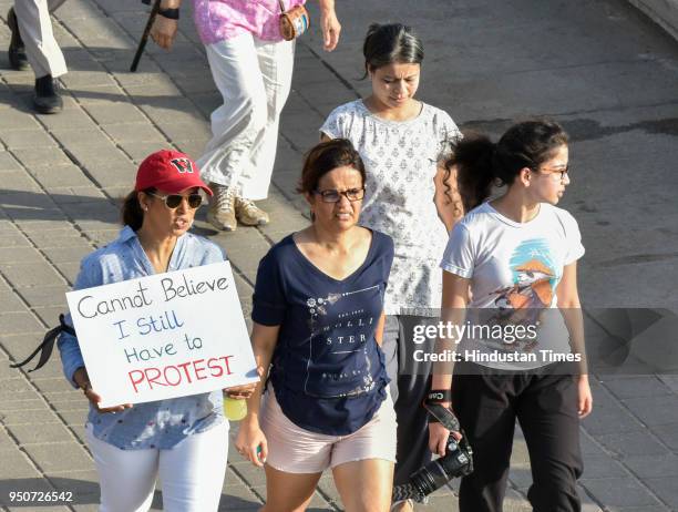 People took part in peaceful walk along with Nirbhaya's parents from Nariman Point to Girgaon Chowpatty against the rape incidents, on April 23, 2018...