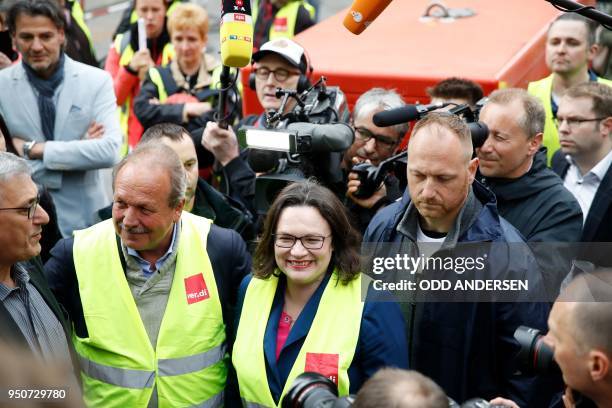 Andrea Nahles , Chairwoman of the German Social Democratic Party and Frank Bsirske , chairman of German trade union Verdi, join Amazon employees...