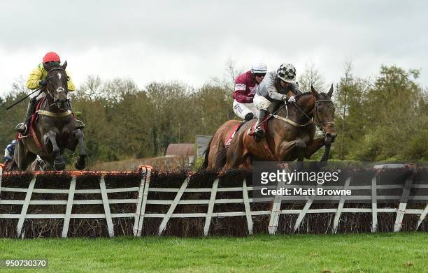 Naas , Ireland - 24 April 2018; Draconien, with Noel Fehily up, jump the last on their way to winning The Herald Champion Novice Hurdle from second...