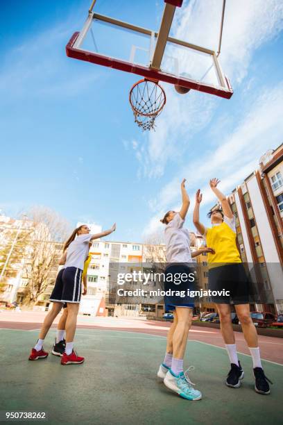 basketball relaxation - woman yellow basketball stock pictures, royalty-free photos & images