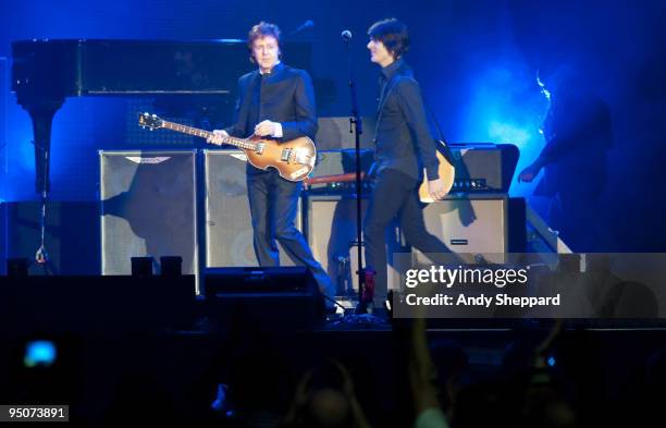 Paul McCartney and Rusty Anderson perform on stage at O2 Arena on December 22, 2009 in London, England.