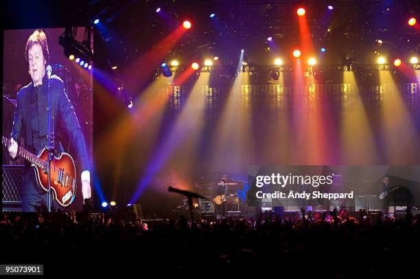 Rusty Anderson, Paul McCartney and Brian Ray perform on stage at O2 Arena on December 22, 2009 in London, England.