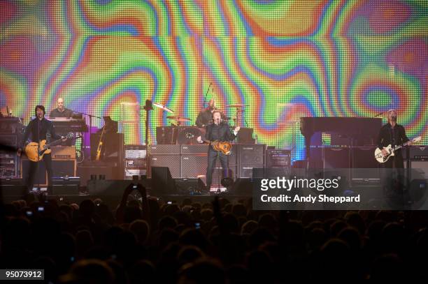 Rusty Anderson, Paul McCartney and Brian Ray perform on stage at O2 Arena on December 22, 2009 in London, England.