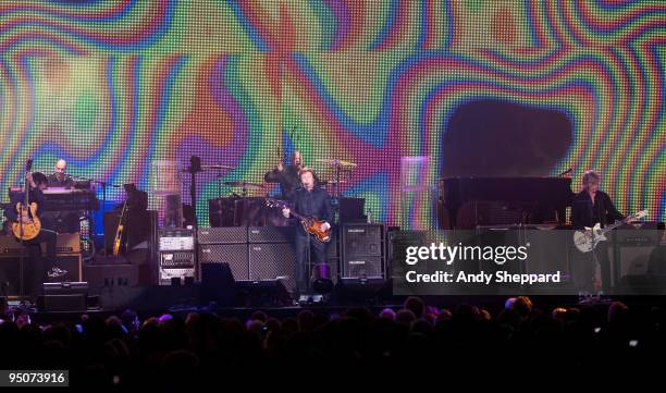 Rusty Anderson, Paul McCartney and Brian Ray perform on stage at O2 Arena on December 22, 2009 in London, England.