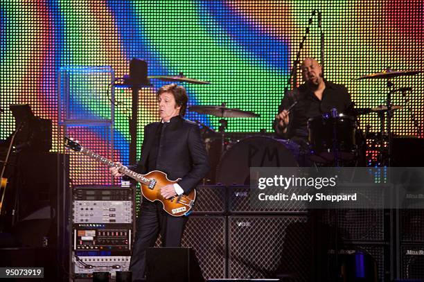 Paul McCartney and Abe Laboriel Jr perform on stage at O2 Arena on December 22, 2009 in London, England.