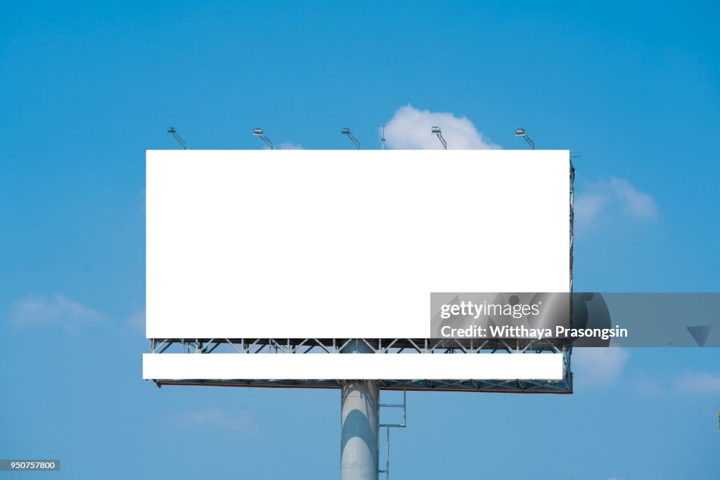 Blank billboard at blue sky background, mock up
