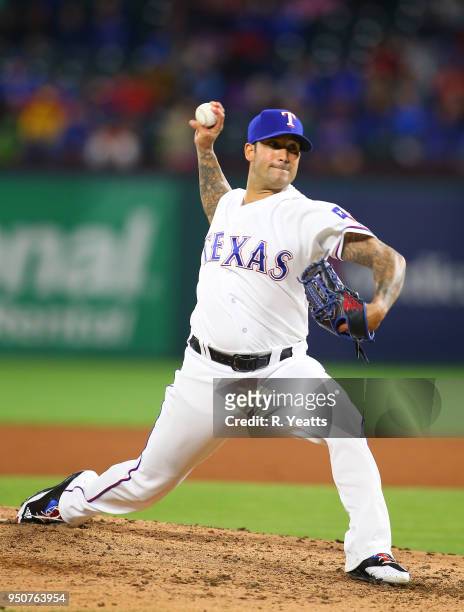 Matt Bush of the Texas Rangers throws in the sixth inning against the Seattle Mariners at Globe Life Park in Arlington on April 21, 2018 in...