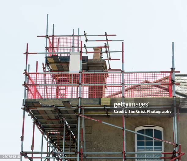 scaffolding against a chimney - kamin konstruktion stock-fotos und bilder