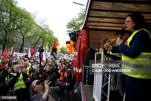 Andrea Nahles, Chairwoman of the German Social Democratic Party addresses Amazon employees protesting against Amazon CEO Jeff Bezos before he arrives...