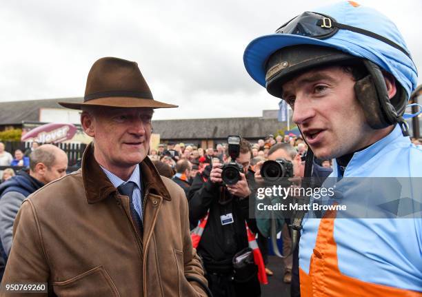 Naas , Ireland - 24 April 2018; Trainer Willie Mullins, left, with jockey Patrick Mullins after sending out Un De Sceaux to win the BoyleSports...