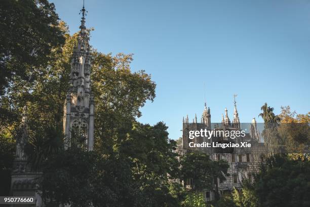 the chapel and palace of quinta de regaleira, sintra, portugal - quinta da regaleira photos stock pictures, royalty-free photos & images