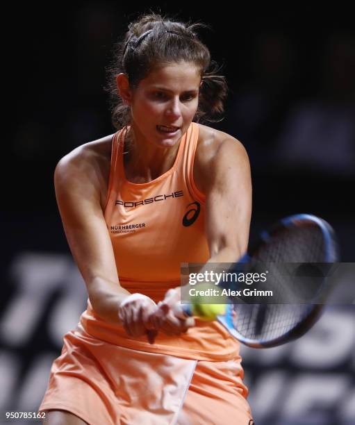 Julia Goerges of Germany plays a backhand to Marketa Vondrousova of Czech Republic during day 2 of the Porsche Tennis Grand Prix at Porsche-Arena on...