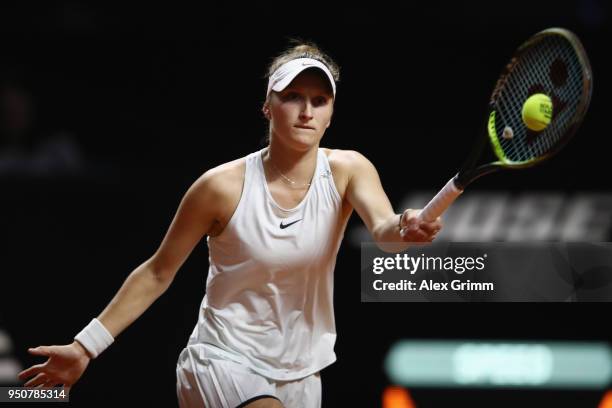 Marketa Vondrousova of Czech Republic plays a forehand to Julia Goerges of Germany during day 2 of the Porsche Tennis Grand Prix at Porsche-Arena on...