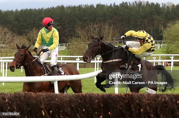 Al Bourm Photo ridden by Jockey Paul Townend collides with Finian's Oscar ridden by Jockey Robbie Power during day one of the Punchestown Festival...