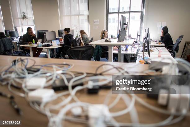 Employees work on computers inside the Mapbox Inc. Headquarters in San Francisco, California, U.S., on Monday, March 5, 2018. Mapbox is a company on...