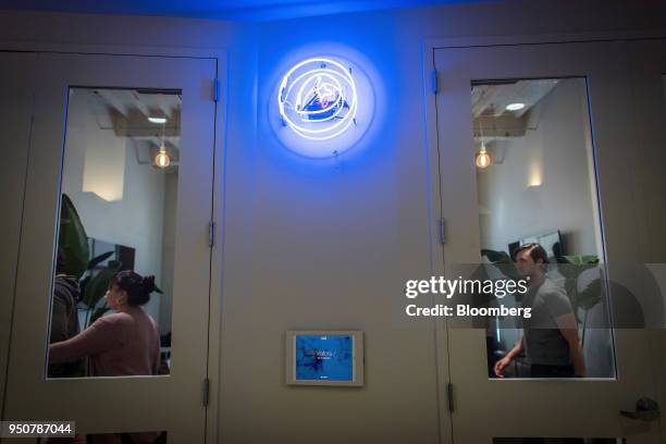 Employees walk past the entrance to the Mapbox Inc. Headquarters in San Francisco, California, U.S., on Monday, March 5, 2018. Mapbox is a company on...