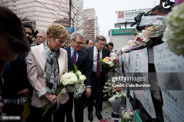 Ontario Premier Kathleen Wynne and Toronto Mayor John Tory visit a memorial for victims of the mass killing on Yonge St. At Finch Ave. On April 24,...