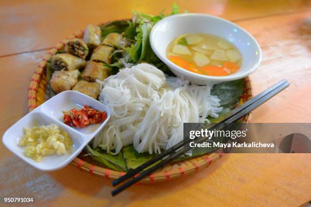 bun cha, rice noodles and spring rolls, vietnamese food - nuoc cham stock pictures, royalty-free photos & images