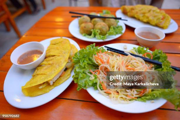 mango salad and pancakes in phong nha restaurant, vietnam - nuoc cham stock pictures, royalty-free photos & images