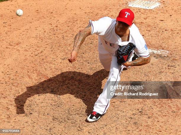 Matt Bush of the Texas Rangers pitches in the seventh inning against the Seattle Mariners at Globe Life Park in Arlington on April 22, 2018 in...