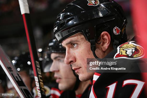 Filip Kuba of the Ottawa Senators looks on from the bench during a game against the Carolina Hurricanes at Scotiabank Place on December 12, 2009 in...