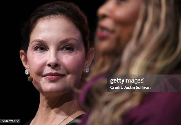Actress and activist Ashley Judd looks on as Adama Iwu speaks during the 29th annual Conference of the Professional Businesswomen of California on...