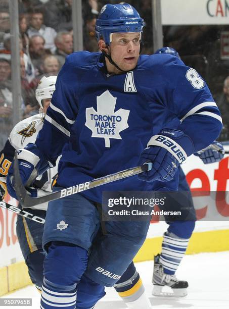 Mike Komisarek of the Toronto Maple Leafs skates in a game against the Buffalo Sabres on December 21, 2009 at the Air Canada Centre in Toronto,...