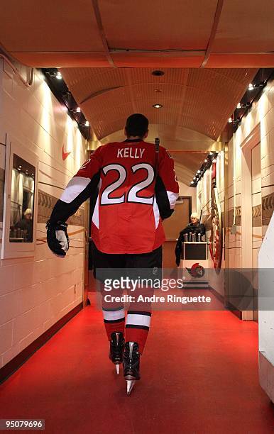 Chris Kelly of the Ottawa Senators walks down the players' tunnel after warmups prior to a game against the Buffalo Sabres at Scotiabank Place on...