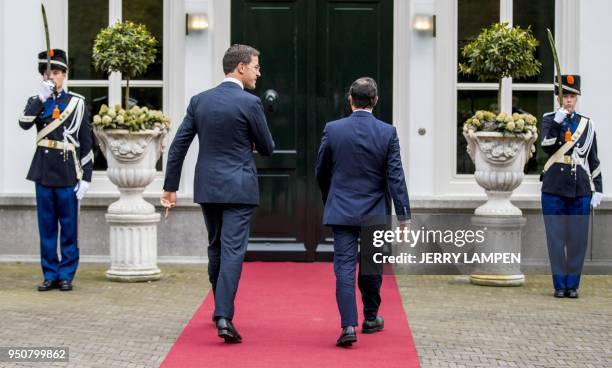 Mexican President Enrique Pena Nieto is welcomed by Dutch Prime Minister Mark Rutte for a working dinner with the the Dutch minister of...