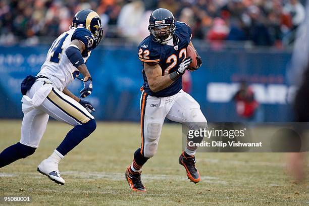 Matt Forte of the Chicago Bears rushes against the St. Louis Rams at Soldier Field on December 6, 2009 in Chicago, Illinois. The Bears beat the Rams...