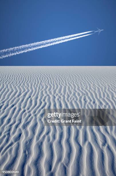 double exposure commercial jet flying over desert. - alamogordo stock pictures, royalty-free photos & images