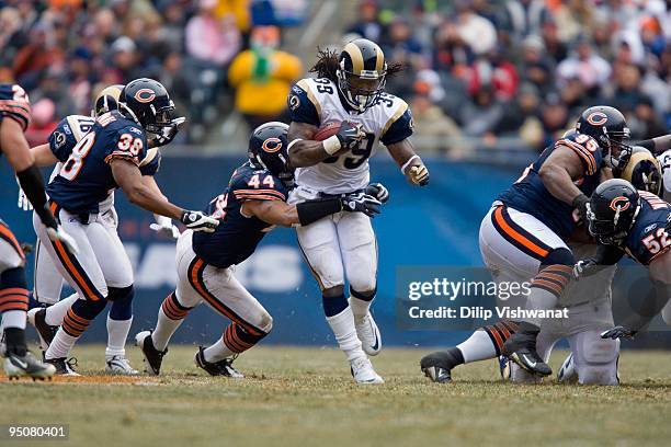 Steven Jackson of the St. Louis Rams rushes against the Chicago Bears at Soldier Field on December 6, 2009 in Chicago, Illinois. The Bears beat the...