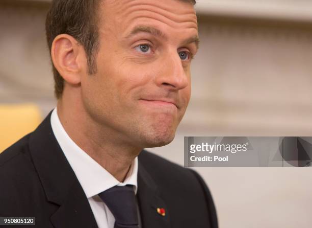 President Emmanuel Macron of France speaks to the media during a meeting with President Donald Trump April 24, 2018 in the Oval Office at the White...