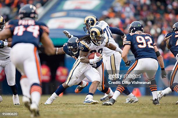 Steven Jackson of the St. Louis Rams rushes against the Chicago Bears at Soldier Field on December 6, 2009 in Chicago, Illinois. The Bears beat the...