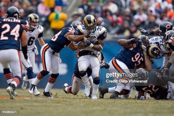 Steven Jackson of the St. Louis Rams rushes against the Chicago Bears at Soldier Field on December 6, 2009 in Chicago, Illinois. The Bears beat the...