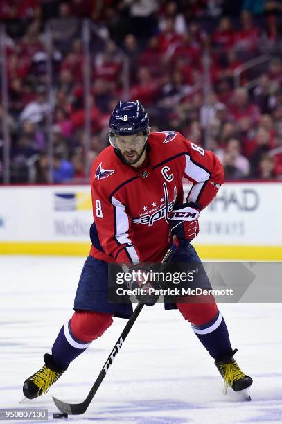 Alex Ovechkin of the Washington Capitals skates with the puck in the first period against the Columbus Blue Jackets in Game Five of the Eastern...