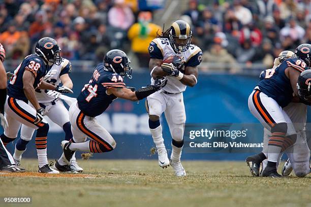 Steven Jackson of the St. Louis Rams rushes against the Chicago Bears at Soldier Field on December 6, 2009 in Chicago, Illinois. The Bears beat the...